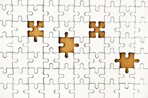 White Jigsaw Puzzle Drucke: White puzzle with several pieces missing