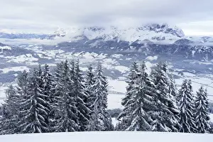 Sacred Building In The Mountains Drucke: Wilder Kaiser in winter in the clouds