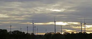 Renewable Energy Production Germany Drucke: Wind power plants, clouds, sunset