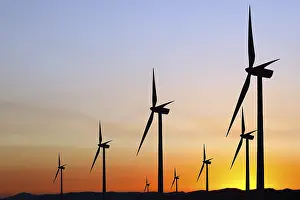 Deserted Windmill Drucke: Wind power at sunset