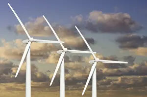 Aviation Industry Equipment Drucke: Three wind turbines over dramatic blue sky and clouds