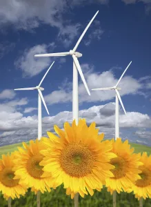 Atmospheric Nature Scene Drucke: Wind turbines against dramatic sky
