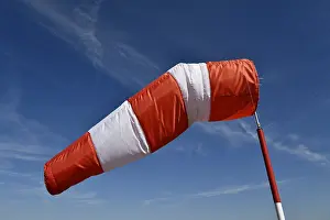 Stormy Weather Forecast Images Drucke: Wind vane during storm, wind direction indicator during strong wind event