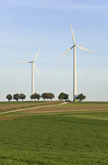 Alternative Energy Solutions Drucke: Two wind wheels on a hill