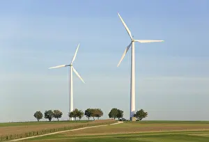 Green Energy Generation Drucke: Two wind wheels on a hill
