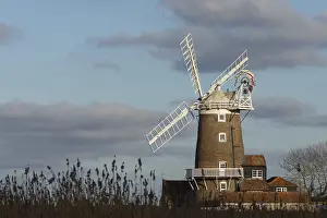 White Clouds England Drucke: Windmill with a blue sky and white clouds behind