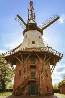 Abandoned Mill Building Drucke: A Windmill under the Cloudy Sky
