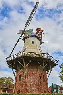 Deserted Windmill Drucke: A Windmill under the Cloudy Sky