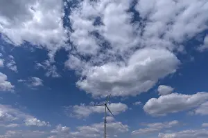 Renewable Energy Industry Drucke: Windmill with cloudy sky, Bavaria, Germany