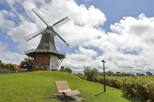 Windmill Germany Drucke: A windmill in front of a dramatic blue sky