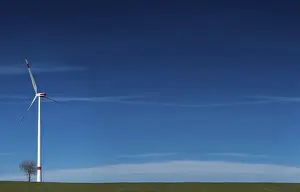 Eco Friendly Power Supply Drucke: A windmill in the field with copy space