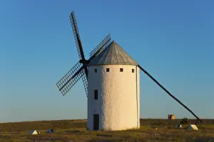 European Evening Light Scene Drucke: A windmill illuminated by the warm light of the sunset