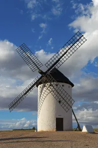 Don Quixote Route Photography Drucke: A windmill in front of an impressive sky full of clouds