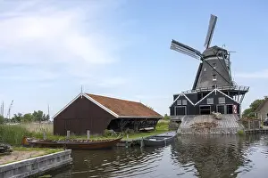 Historic Dutch Windmill Scene Drucke: Windmill De Rat on the river Geeuw