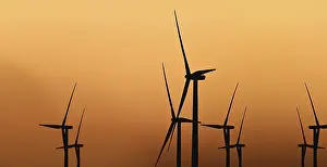 Deserted Windmill Scene Drucke: Windmill at sunset against light