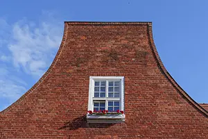 Blue Sky Europe Drucke: Window in brick wall with flower box