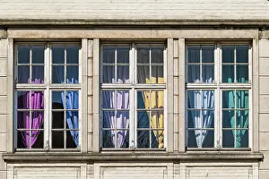 Residential House Exterior View Drucke: Window with curtains in primary colours