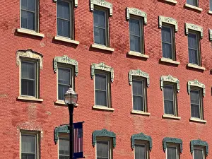 Old City Architecture Drucke: Many windows on an old red brick building