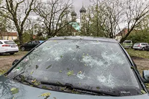 Severe Weather In Southern Germany Drucke: Windscreen of a car destroyed by hail