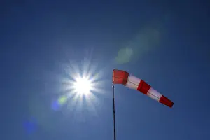 Bavaria Weather Forecast Drucke: Windsock with sun star against light