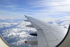 Cloudless Blue Sky Photo Drucke: Wing of an airplane, view from window