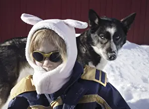 Female Portrait With Dog Drucke: Winter hat with funny ears