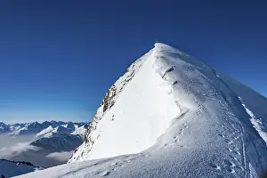 Tyrol Alps Drucke: Winter summit ridge of the Schneidspitze
