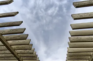 Empty Cloudy Skies Drucke: Wooden planks on a background of sky and clouds abstract pattern