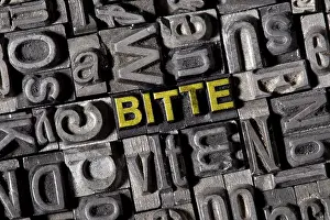 Printing Press Lettering Drucke: The word 'Bitte', German for 'please'