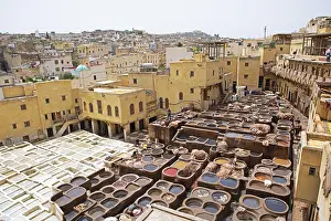 Old Town Morocco Photography Drucke: Workers dyeing leather, basin with dye
