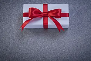 Birthday Present Idea Drucke: Wrapped present box on grey surface holidays concept