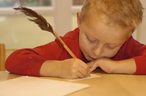 Indoor Portrait Photography Drucke: Five year old boy writing