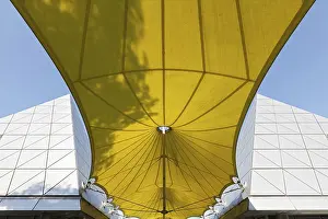 Contemporary Architectural Style Germany Drucke: Yellow awning with shadow of a tree
