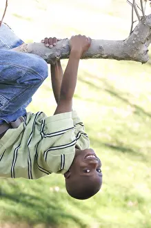 Portrait Of A Boy Drucke: Young boy having fun in the park