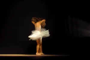 Contemporary Dance Movement Drucke: Young dancer with motion blurred during presentation of modern dance show