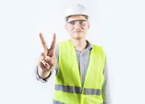 Young Engineer Drucke: Young engineer counting number two isolated