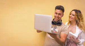 Computer Workstation Drucke: Young entrepreneur couple doing teamwork with a computer