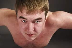 Fitness Training For Men Drucke: Young fat man doing push up exercise