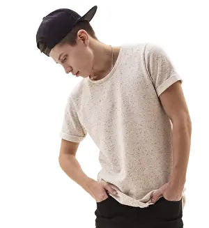 Young Rapper Drucke: Young handsome rap dancer in black baseball cap posing in studio