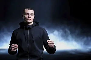 Studio Photography Concept Image Drucke: Young kickboxer posing in the studio