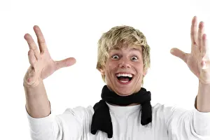 Caucasian Ethnicity Studio Shot Drucke: Young man beaming with joy