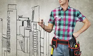 Industrial Building Development Drucke: Young man builder with ruler in hands draw construction model