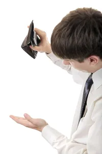 Empty Wallet Drucke: Young Man Checking Empty Wallet