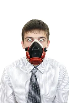 Protective Clothing Image Drucke: Young Man in protective mask on the white background