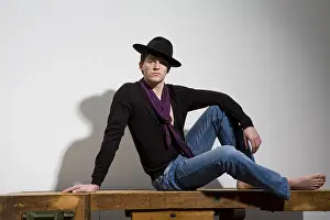 Male Model Studio Shot Drucke: Young man wearing a hat, posing
