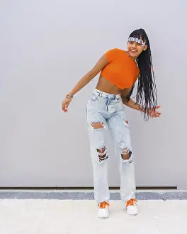 Young Trap Dancer Drucke: A young trap dancer with braids