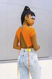 Young Trap Dancer Drucke: A young trap dancer with braids