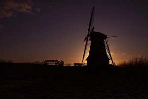 Sunrise In Europe Drucke: Dutch windmill