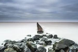 Netherlands Travel Destination Drucke: Mudflats at Holwerd