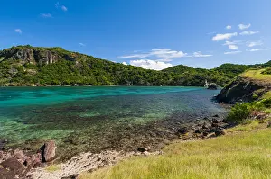 Guadeloupe Island Drucke: Steep cliffs border the tranquil waters of Marigor Bay